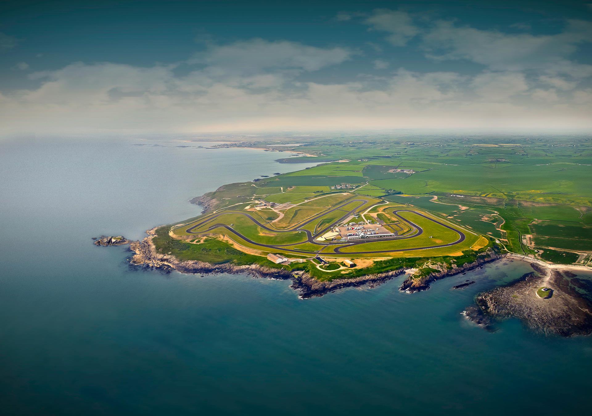 Aerial view of the circuit on a peninsula surrounded by the sea.