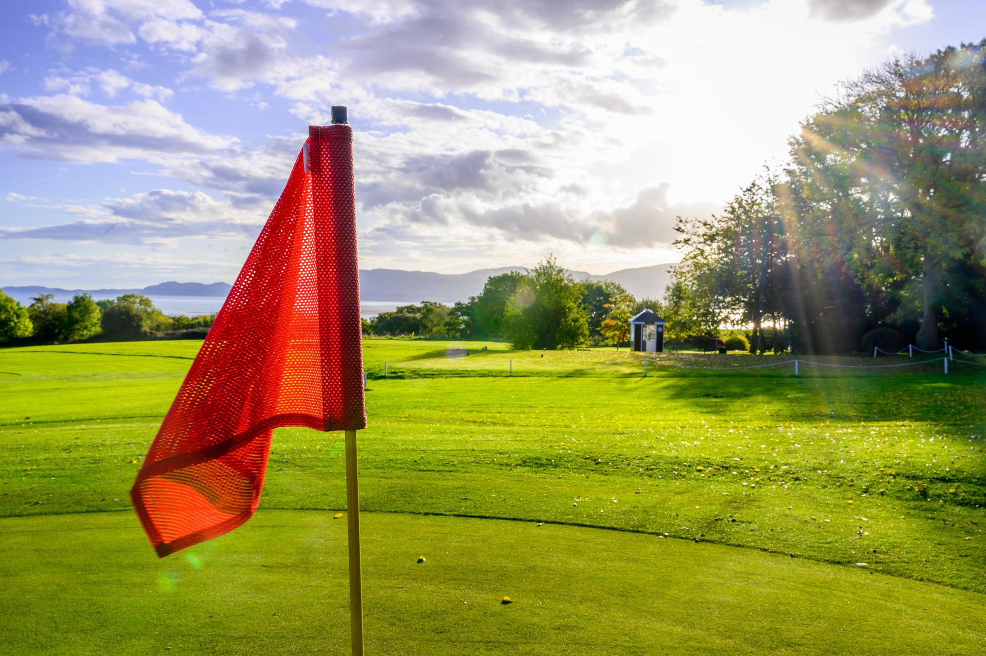 A red golf flag at Beaumaris Golf Club