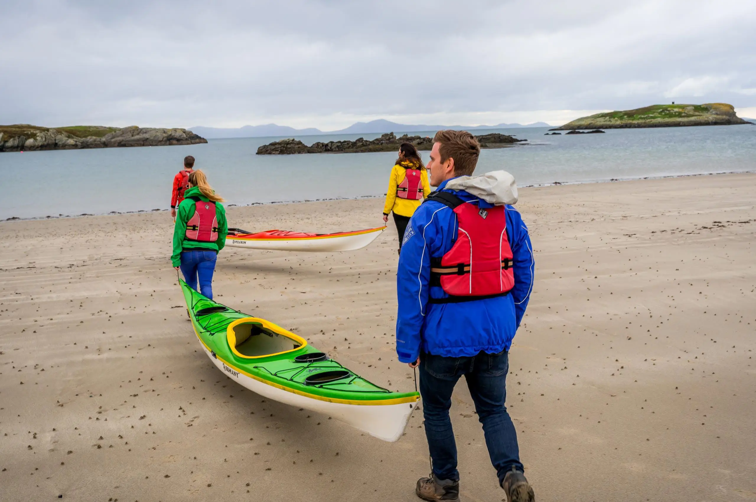 Anglesey - Rhoscolyn - Kayaking - people Walking with kayaks